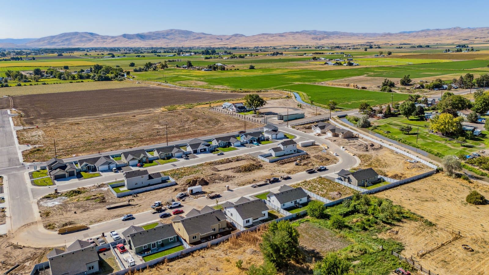 Aerial view of the Old's Ferry subdivision in Weiser with the Weiser River valley beyond