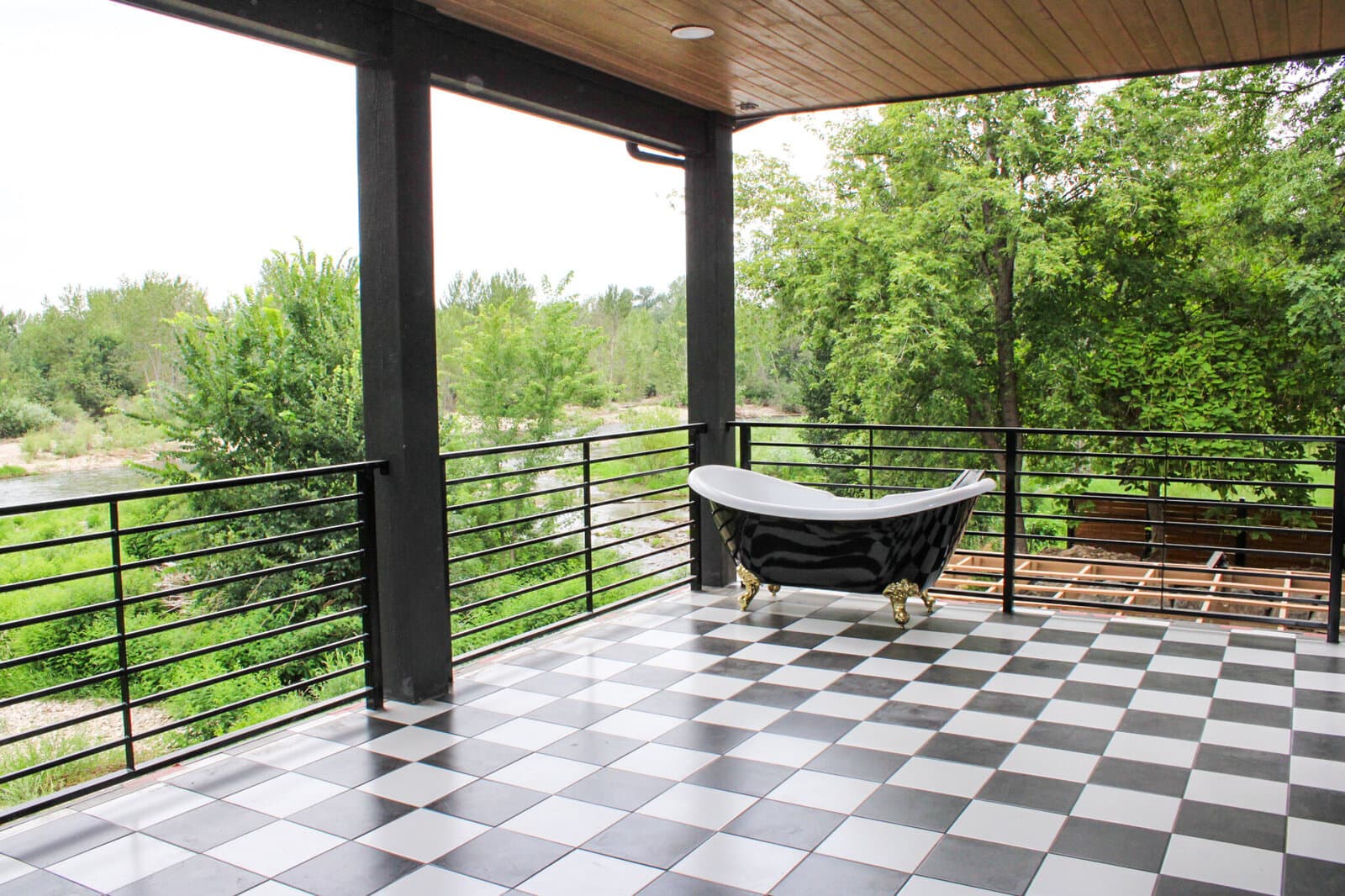 Covered balcony on a custom home built by TKO Homes